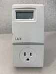 Used Lux WIN100 5-2 Day Heating & Cooling Outlet Thermostat Low Voltage. Fixed Price $22.00.
