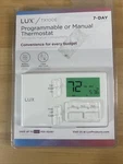 Lux Programmable Or Manual Heat & Cool Thermostat TX100E New Sealed. Fixed Price $26.70.