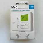 Lux Programmable Or Manual Heat & Cool Thermostat TX100E. Fixed Price $9.99.